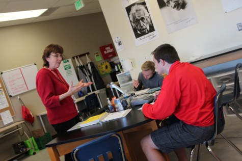 Mrs. Bartholomew helping out students