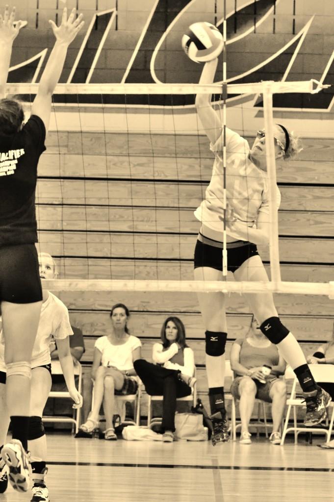 Mary Raitt 16 goes up for an outside hit and kill capturing the essence of this seasons motto: #Hangtime.