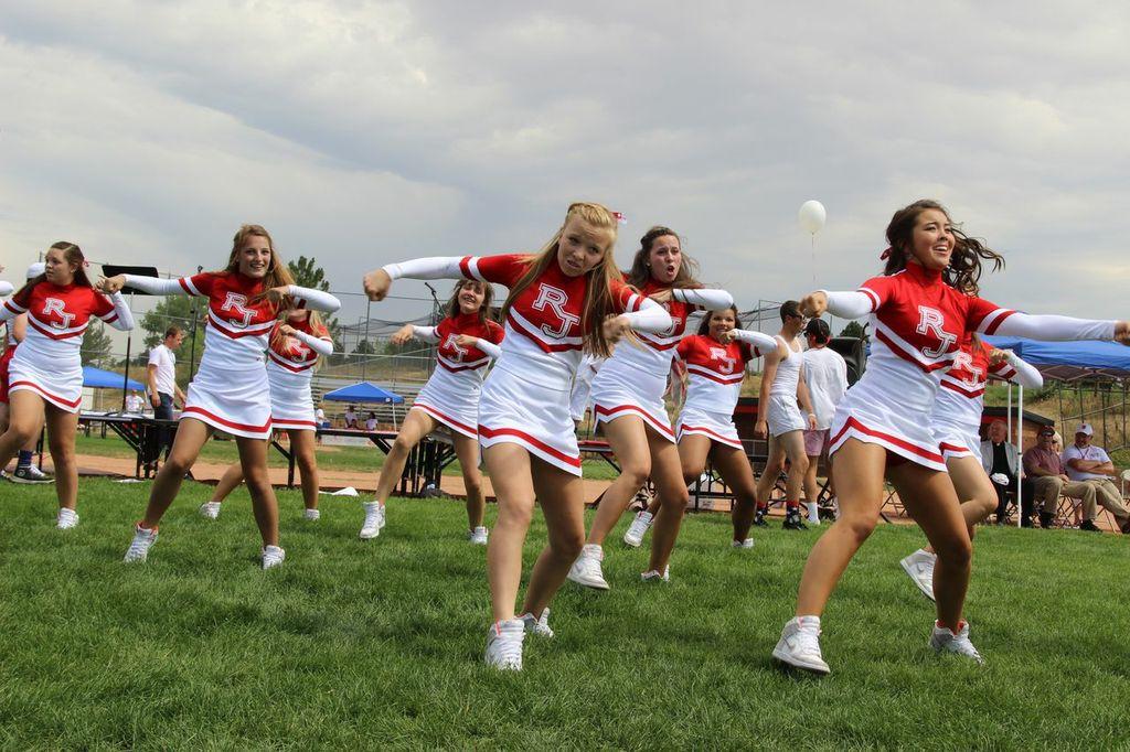 The Varsity Poms team performs at an August school-wide event. 
Photo: Kennedy Krause 14