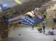 A member of the rock climbing club practices at one of their weekely meetings.