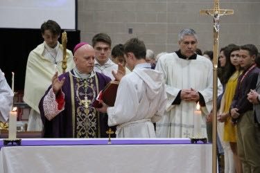 Archbishop Comes to Celebrate Mass with Regis Jesuit