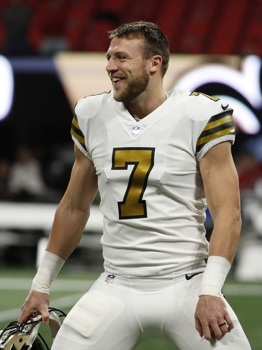Taysom Hill smiling after a win (Wikimedia commons fair use)