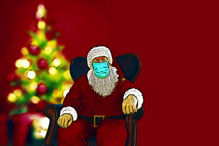 Santa+Sits+Next+to+a+Christmas+tree+while+wearing+a+mask+%28Pixabay%29