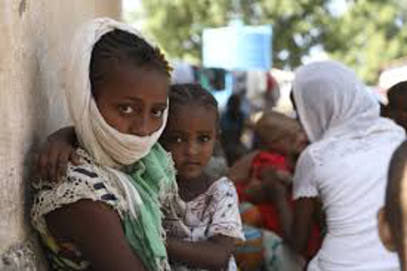 Refuges+from+Tigray++wait+to+register+at+the+United+Nation+High+Commissioner+for+Refugees+in+Hamdayed%2C+Sudan%2C+to+flee+the+country+%28+Marian+Ali%2C+Associated+Press%29