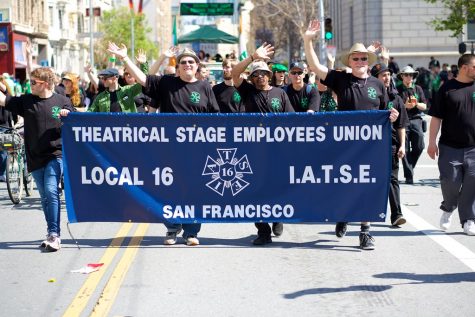 IATSE members walk the streets of San Francisco on St. Patricks day, proudly waving to the crowd. However, those proud waves have turned into closed fists as members march the streets with a desire for change.