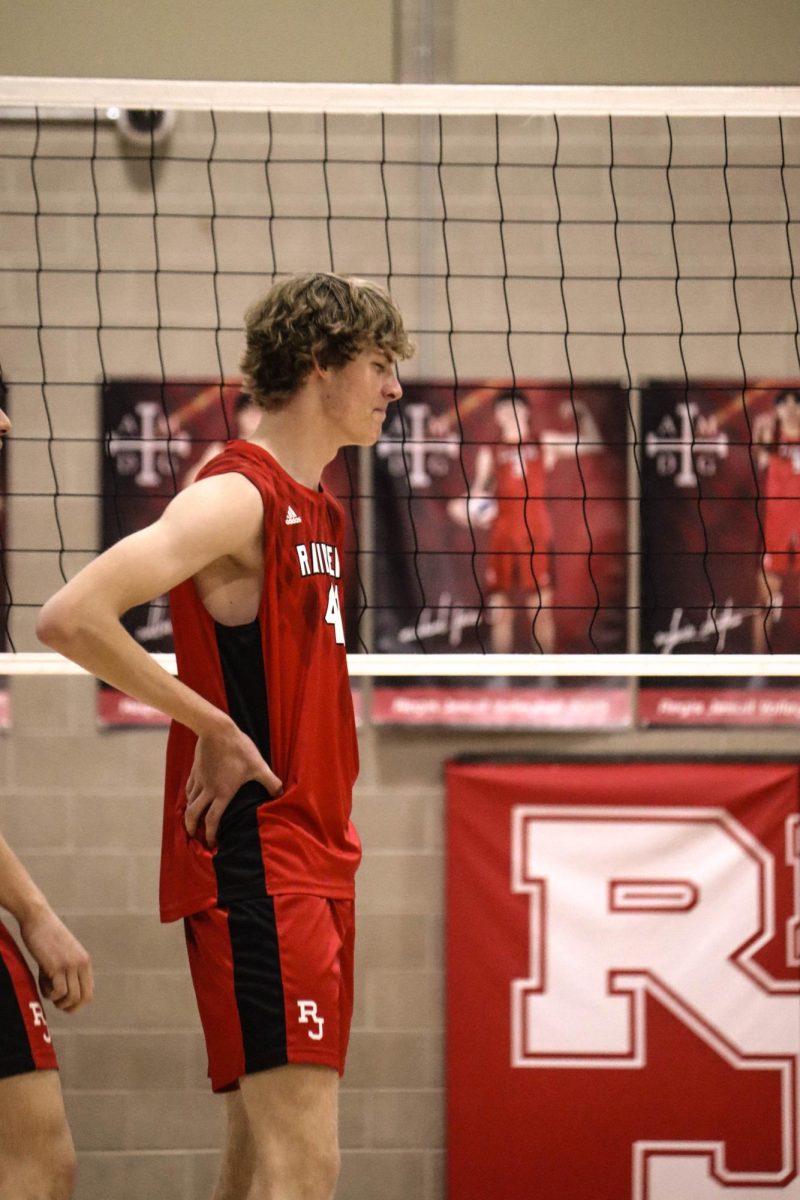 Freshman Jackson Feik grimacing after a failed spike on April/15/2025 against Rock Canyon.