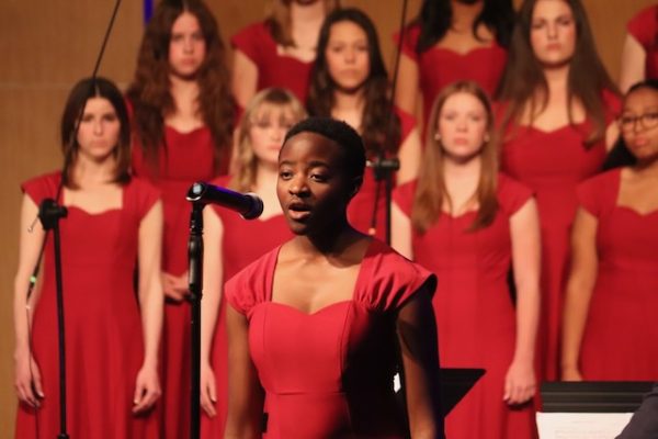 OraVera Konadu-Acheampong ’25 sings a solo Healed in Christ at the Spring Choral Concert, the audience were astonished. Photo by Amaiyah Broxton ’25.