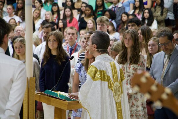 Fr. Gary Menard, SJ Begins his prayers at the alter