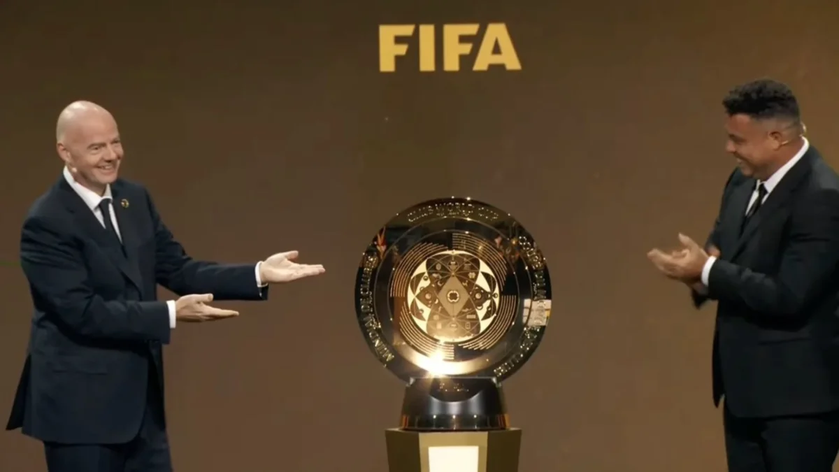 FIFA President Gianni Infantino and football legend Ronaldo Nazário presenting the new Club World Cup trophy.
Photo Via Sports Illustrated