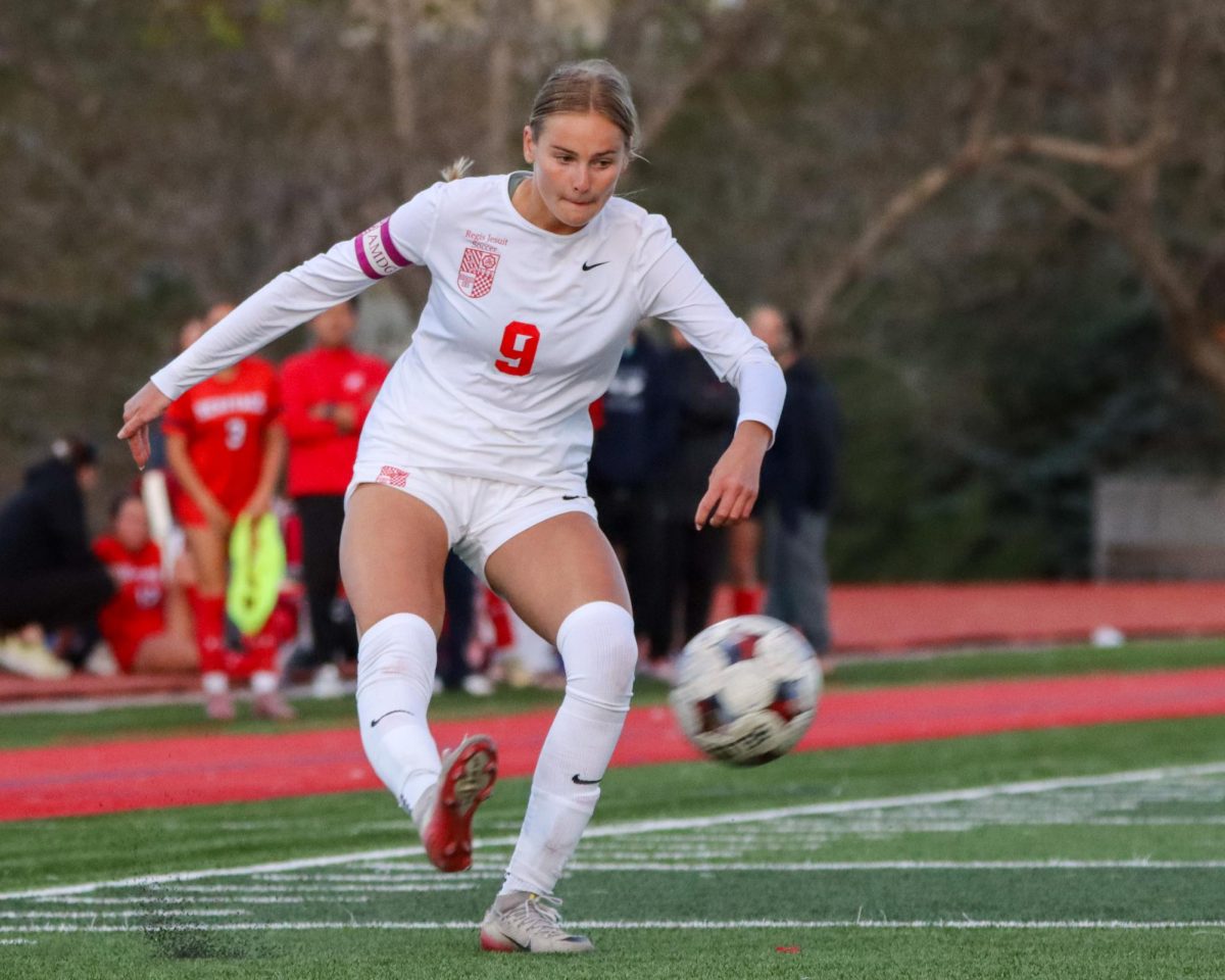 Senior Annabelle Turner takes a Free kick in the match against Heritage.